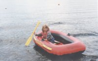 Jennifer in dinghy on Loch Lomond. Call
the coastguard
